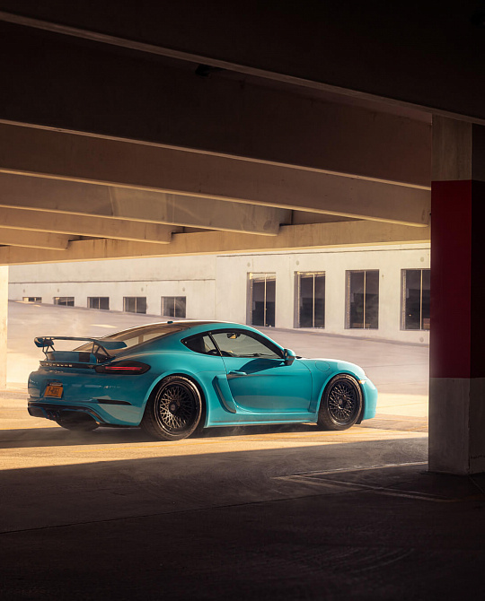 Фото дисков 501 Черный сатин на Porsche Cayman III