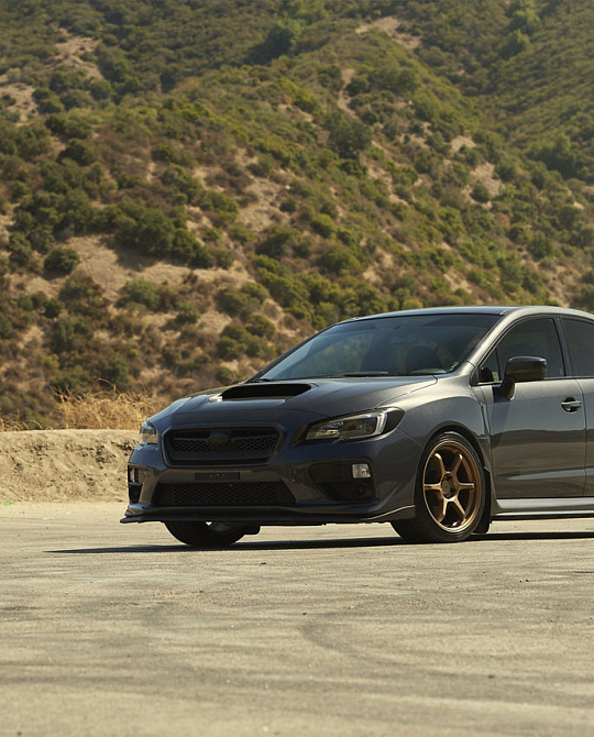 Фото дисков MR145 TRAKLITE 3.0 Сатиновое золото на Subaru WRX VA