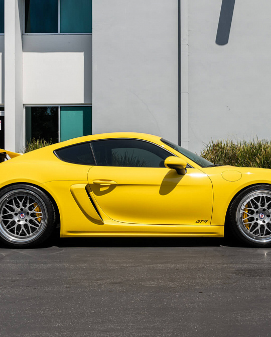 Фото дисков 300 Серебро на Porsche Cayman III