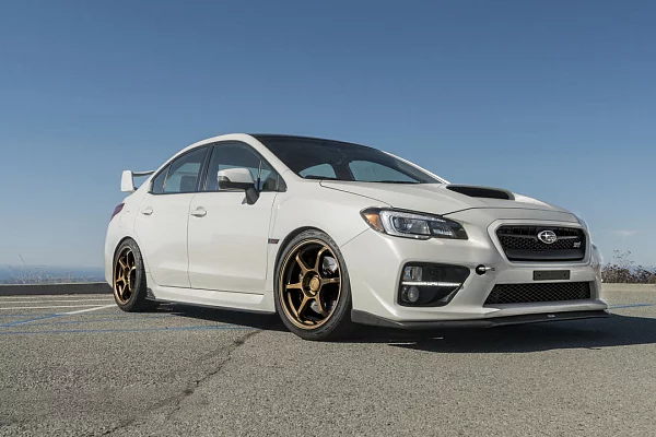 Фото дисков Motegi Racing MR145 TRAKLITE 3.0 Сатиновое темное золото на Subaru WRX VA