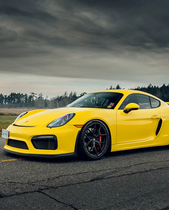 Фото дисков S21-01 Черный сатин на Porsche Cayman II