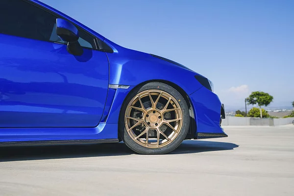 Фото дисков Motegi Racing MR147 CM7 Сатиновое золото на Subaru WRX VA